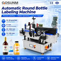 Machine d'étiquetage automatique compacte pour bouteilles rondes, pour petites et moyennes productions