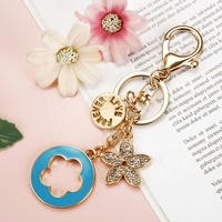 Porte-clés créatif personnalisé de haute qualité avec strass, motif trèfle à cinq feuilles porte-bonheur, pour la décoration