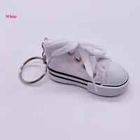 Porte-clés en caoutchouc en forme de chaussure de sport 3D de dessin animé, en toile
