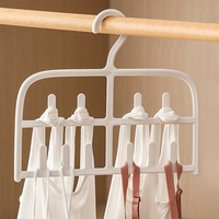 Cintre en plastique blanc double couche avec crochets multiples pour organiser les vêtements dans le placard, la salle de bain et la cuisine