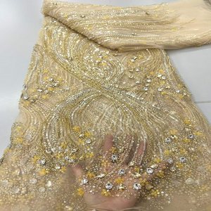 Tissu de robe de cérémonie haut de gamme, tissu brodé de sequins haute densité pour robe de mariée, tissu brodé de perles multicolores. - Product Image 1
