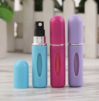 Bouteilles cylindriques en plastique d'huiles essentielles de vaporisateur de remplissage de fond de mini-portable imprimé de 5ml avec logo personnalisé pour le sous-emballage de parfum