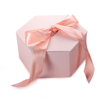 Boîte cadeau hexagonale en carton ondulé haut de gamme personnalisable avec nœud en ruban satiné, taille et couleur personnalisées pour les mariages et les cadeaux de fête