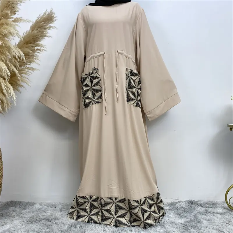 Hete Verkoop Eenvoudige En Elegante Moslim Dubai Kleding Met Twee Zakken Gesloten Abaya Maxi Dames Casual Moslim Eendelig