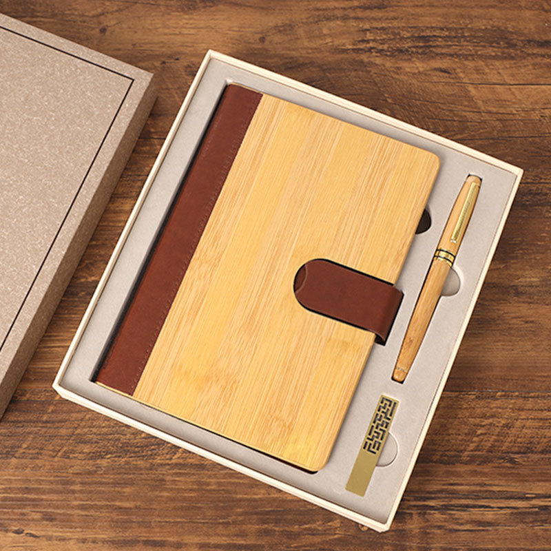 cahier + stylo + clé USB