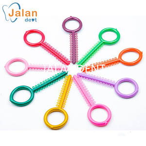 วงแหวนยางรัดฟันแบบยืดหยุ่นสำหรับจัดฟันยางรัดยางโอริงทันตกรรมสีสันสดใส - Product Image 1