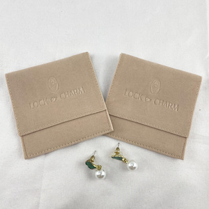 Wholesale Rings Jewelry Emboss Suede Microfiber Jewelry Pouch with Insert Pad Custom logo Velvet Jewelry Packaging Bags Display - Product Image 6