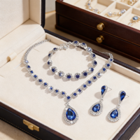 Elegante Conjunto de Tres Piezas de Aretes, Collar y Pulsera con Pedrería Azul Agua, Chapado en Plata/Aleación de Oro Puro, Regalo de Compromiso