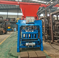 Machine à fabriquer des briques, machine à fabriquer des blocs de briques emboîtables, machine à fabriquer des briques de terre