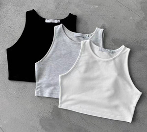 Camiseta sin mangas de algodón transpirable para mujer, diseño personalizado, compra al por mayor, con cuello redondo liso y logo frontal, ideal para gimnasio. - Product Image 1