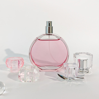 Flacon de parfum vide en verre transparent rose de luxe haut de gamme de 100 ml avec pompe pulvérisatrice, fabriqué par le fabricant