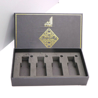 Boîte de parfum en carton noir de haute qualité avec revêtement en éponge de logo d'estampage en or chaud laminage mat et gaufrage manipulé