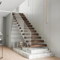 Escaliers flottants sur mesure avec balustrade en verre et bandes de roulement en bois Conception efficace de l'espace pour appartements et villas en duplex