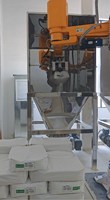 Robot d'expédition de sacs de granulés anti-explosion |   Système robotique antistatique de déballage pour sacs de 25 à 200 kg |   Entièrement personnalisable