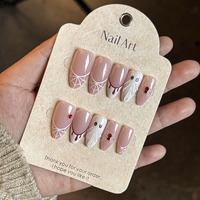 Faux ongles à presser en amande, couleur nude, avec motif fantôme, araignée et goutte de sang pour un style de fête effrayant et mignon