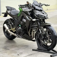 Moto naked Kawasaki 1Z1000 d'occasion, essence, 1000 cm³, moteur quatre cylindres, suspension réglable, plusieurs modes de puissance, puissante