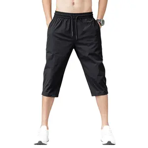 กางเกง3/4ครอปผ้าไอซ์ซิลค์ทรงหลวมมีเชือกผูกสำหรับผู้ชายทรงหลวมกางเกงขายาวยาว3/4ผ้าไหมน้ำแข็งสำหรับผู้ชาย