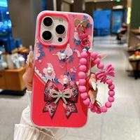 Coque de téléphone de luxe créative en élastomère thermoplastique, motif nœud floral, ornée de diamants et de perles, avec sangle chaîne pulvérisée
