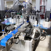 Machine d'étiquetage adhésive double face à grande vitesse pour bouteilles en plastique