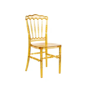 Chaises Napoléon empilables en résine plastique cristal transparentes pour les événements de mariage prix de gros bon marché meubles de maison en or ambre