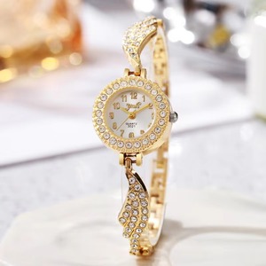 Nuevo reloj para mujer, pequeño, con esfera redonda, reloj de cuarzo, correa con forma de ala con incrustaciones de diamantes de imitación - Product Image 2