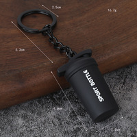 Mini llavero de silicona con disco de pesas de 45LB, colgante 3D de disco de fitness con letras FITNESS en relieve, seis opciones de color, metal negro