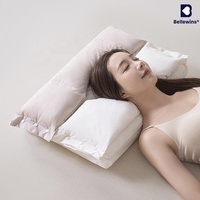 Oreiller combiné 2-en-1 en coton confortable Bellewins avec traction cervicale et protection auditive, bicolore