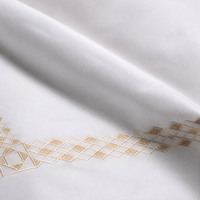 Parure de lit brodée motif losanges champagne, housse de couette blanche, taies d'oreiller, linge de lit d'hôtel avec bordure diamantée