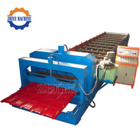 Machine de formage à froid pour tôles de toiture métalliques, machine de formage à froid pour panneaux de toiture vitrés
