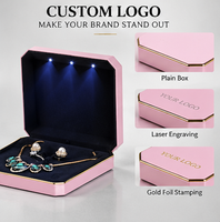 Boîte à bijoux octogonale en plastique avec éclairage LED, multicolores, pour présentation complète de bijoux, vente en gros