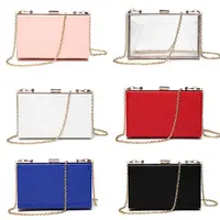 A CLEAR LUCITE CASSETTE EVENING CLUTCH WITH SILVER HARDWARE