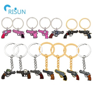 Personalizzato in fabbrica 3D teschio Cross Gun pistola sparatutto con lancia <span class=keywords><strong>per</strong></span> arma da fuoco Llavero portachiavi portachiavi personalizzato <span class=keywords><strong>per</strong></span> pistola portachiavi - Product Image 1