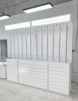 Mobilier de magasin d'optique personnalisé avec vitrine en verre trempé LED, présentoir moderne pour lunettes de vue pour boutique