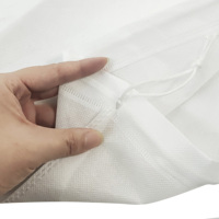 Sac à linge de voyage en non-tissé bon marché en gros Sacs à provisions réutilisables avec cordon de serrage avec logo