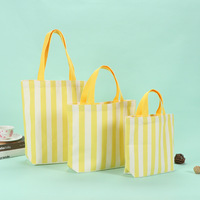 Sac fourre-tout professionnel en nylon noir classique avec logo personnalisé, fermeture éclair cousue, imprimé par transfert thermique, forme personnalisée, sac à cosmétiques