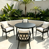 Ensemble de mobilier de jardin moderne et durable en aluminium avec chaises de salle à manger et table ronde pour villa, cour et hôtel
