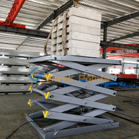 Meilleur prix : Élévateur de fret hydraulique à ciseaux double électrique fixe pour entrepôt et manutention de marchandises