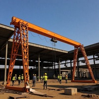 Fabricant de grues portiques vend des grues portiques électriques à double poutre de classe A7 de 24 mètres de portée, capacité 10 tonnes, télécommandées au sol