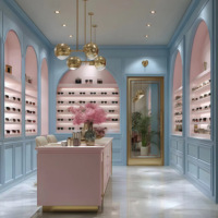 Comptoir d'exposition moderne de luxe en acier inoxydable avec éclairage LED, marque Maxsen, options or/noir pour lunettes haut de gamme sur mesure