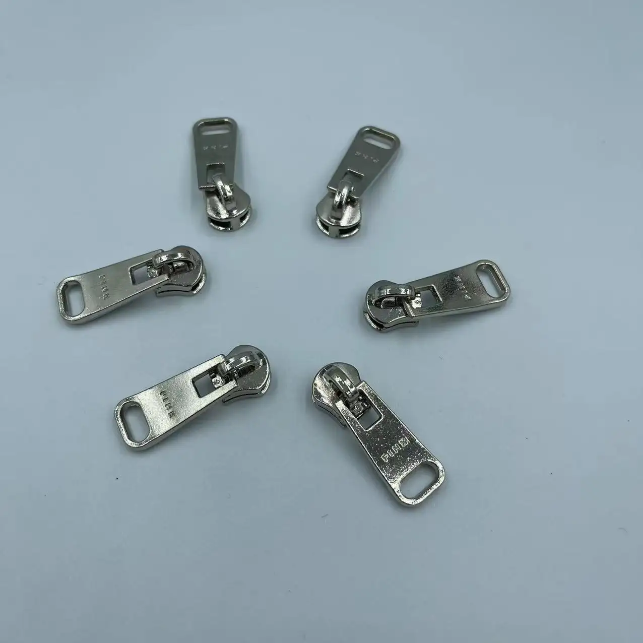 Factory stock 5# resin zipper metal slider head silver color for clothing and luggage