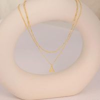 Collier à pendentif lettre double couche chaîne torsadée, tendance et polyvalent, accessoire féminin très prisé