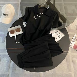 <span class=keywords><strong>Ensemble</strong></span> de sport d'été pour <span class=keywords><strong>femme</strong></span>, couleur unie, nouveau style <span class=keywords><strong>chic</strong></span> occidental, haut à manches courtes, boutons grenouille, taille cintrée, pantalon large, une pièce - Product Image 2