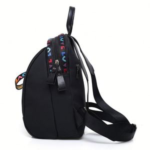Sac à dos mini antivol personnalisé en nylon tendance pour femme, sac à bandoulière de voyage pour femme avec porte-clés ours - Product Image 4