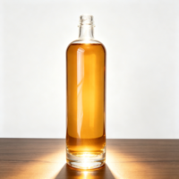 Bouteille de tequila ronde gravée en verre extra clair givré de 750 ml avec bouchon en caoutchouc, emballée en boîte, OEM ODM