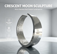 Sculpture circulaire abstraite moderne en acier inoxydable poli effet miroir traditionnel