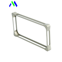 Supports de montage en plastique noir usinés CNC personnalisés Composants mécaniques industriels de haute précision avec trous