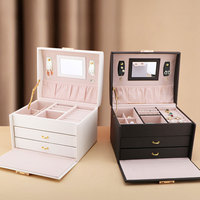 Vente en gros de luxe Grande mallette de rangement pour bijoux Grand tiroir à 3 niveaux Miroir en cuir PU Organisateur Valise Boîte à bijoux avec poignée