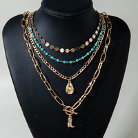 Bijoux transfrontaliers : Pendentif botte de cowboy bohème western, collier turquoise, forme en Y à plusieurs rangs avec pompons superposés