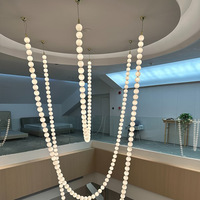 Lustres LED sur mesure d'usine, luminaires modernes en forme de collier long pour escaliers, idéaux pour salon, mariage, hôtel, grande suspension lumineuse