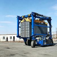 Chariot transitaire à pneus en caoutchouc de 20 tonnes pour la manutention de conteneurs et les opérations de transfert logistique dans les ports maritimes